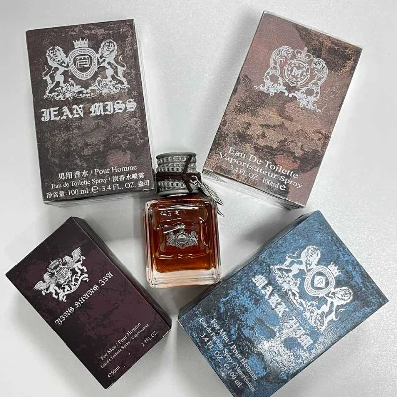 Quatre coffrets Jean Miss avec flacon de parfum ambré au centre